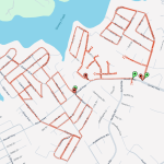 A digital map shows a suburban area with highlighted red routes representing a delivery path. Green and red map pins indicate specific locations, and a body of water labeled "Stoney Creek" is visible at the top. Roads and neighborhoods are labeled.